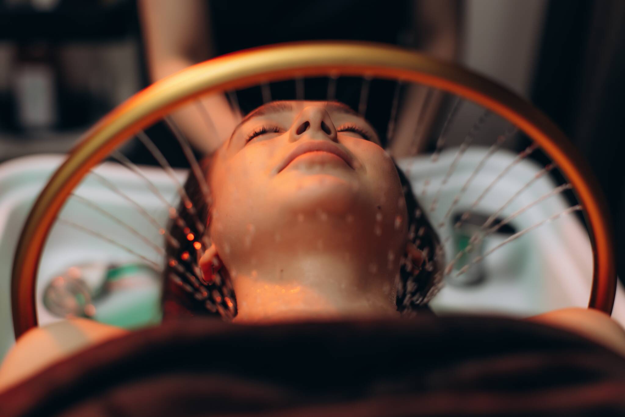 Woman enjoying a spa head massage ritual. Japanese spa head